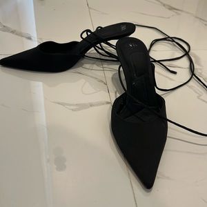 Pointed toe tie up heels